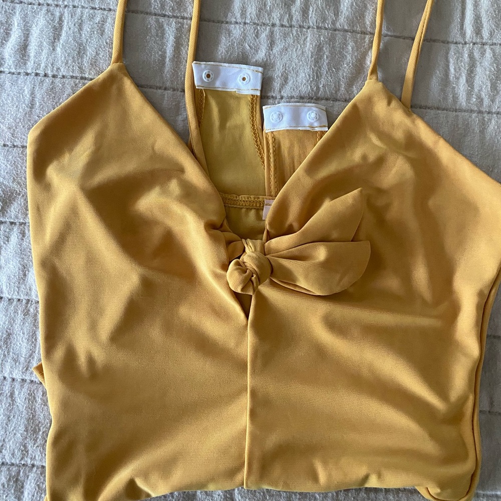 Yellow body suit